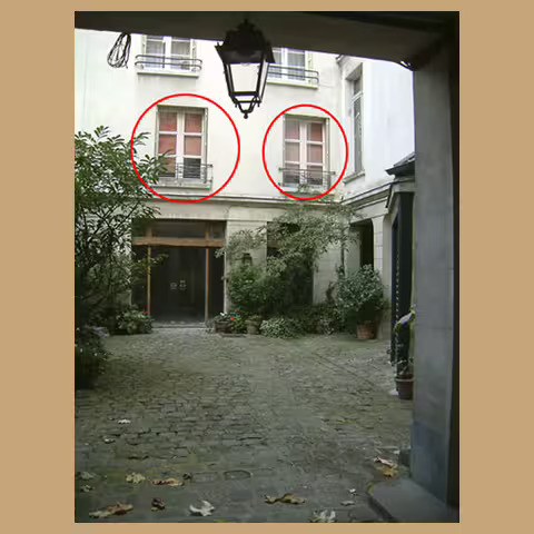 Kig in ad porten til 14, rue Saint-Louis-en-l’Ile